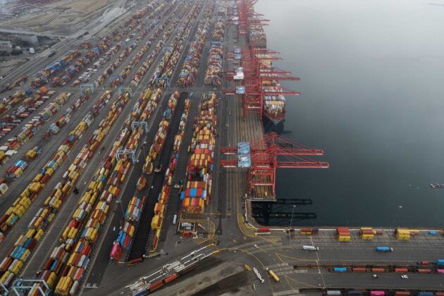Dozens of ships holding $24 billion in goods float outside California’s biggest ports