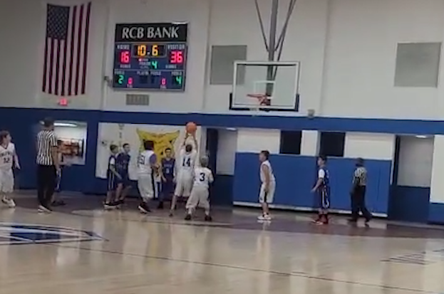 VIDEO: Boy with Down syndrome makes crowd go wild after making shot at basketball game