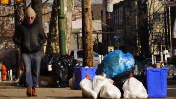 Garbage and recyclables pile up as omicron takes its toll on sanitation workers