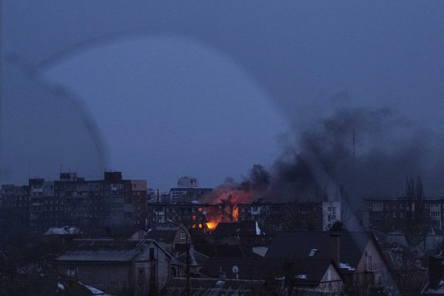 The Latest: Russia strikes near Ukrainian capital; port city under siege