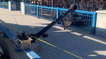 Woman hit by falling pole on Boston bridge in serious condition