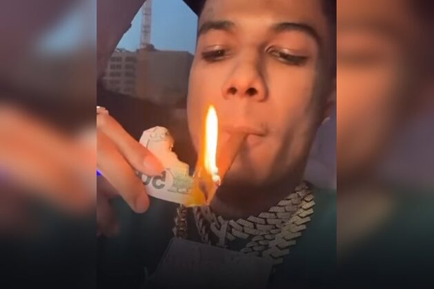 Blueface Lights Blunt With $50 Bill – Watch