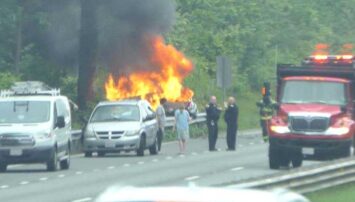 Firefighter saves driver after car hits guardrail, bursts into flames on Route 128