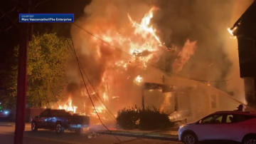 Massive fire engulfs two multi-family homes in Brockton