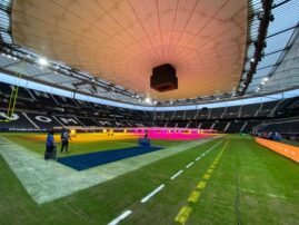 German field remade into Patriots home turf for Sunday’s game