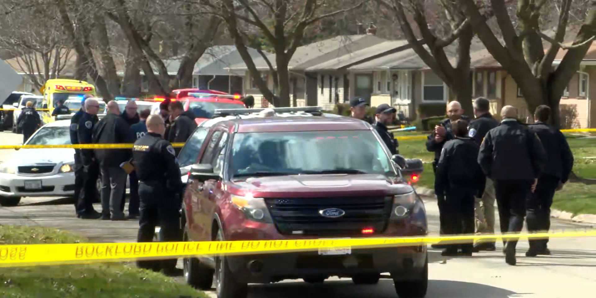 Emergency personnel on the scene of a home invasion and stabbing in Rockford, Illinois, on Wednesday, March 27.