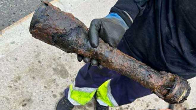 State police say a person fishing with a magnet pulled a heavily-deteriorated bazooka round, possibly from the World War II era, from the Charles River near the Needham-Newton line in Massachusetts on March 6, 2024.