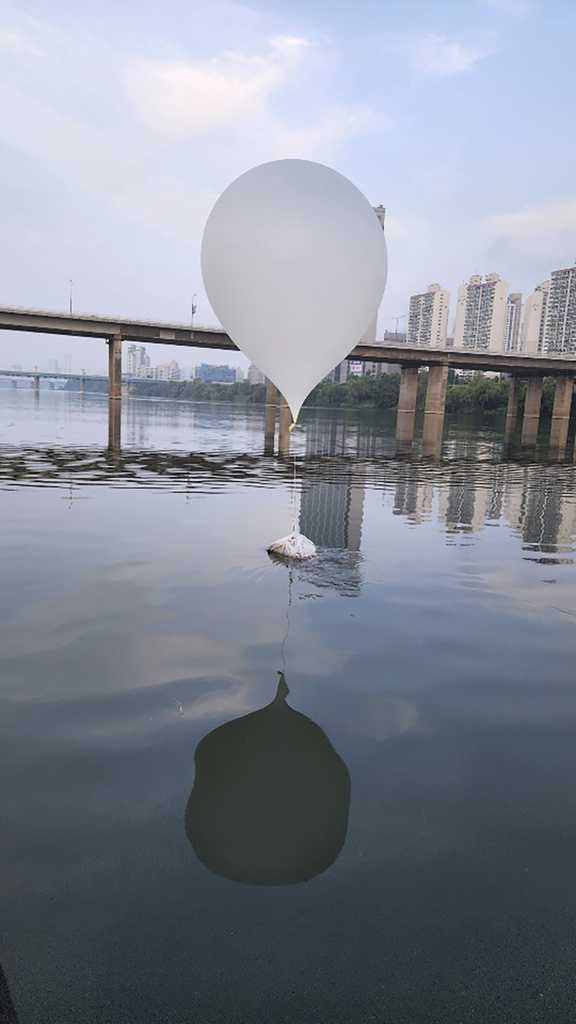 This photo provided by South Korea&amp;apos;s Joint Chiefs of Staff and released by South Korea Defense Ministry, shows a balloon presumably sent by North Korea, on the Han River in Seoul, South Korea, Sunday, June 9, 2024. North Korea flew hundreds of trash-carrying balloons to South Korea again in its third such campaign since late May, the South’s military said, just days after South Korean activists floated their own balloons to scatter propaganda leaflets in the North. (South Korea Joint Chiefs of Staff via AP)