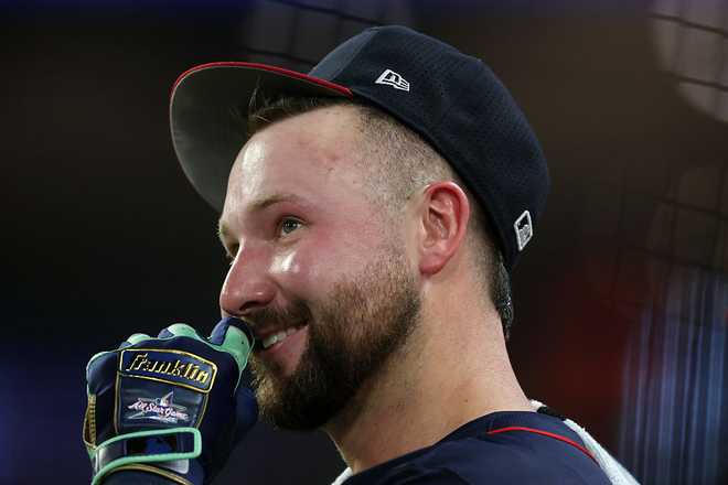 ATLANTA, GEORGIA - JULY 14: Cal Raleigh of the Seattle Mariners reacts during the final round of the Home Run Derby at Truist Park on July 14, 2025, in Atlanta, Georgia.