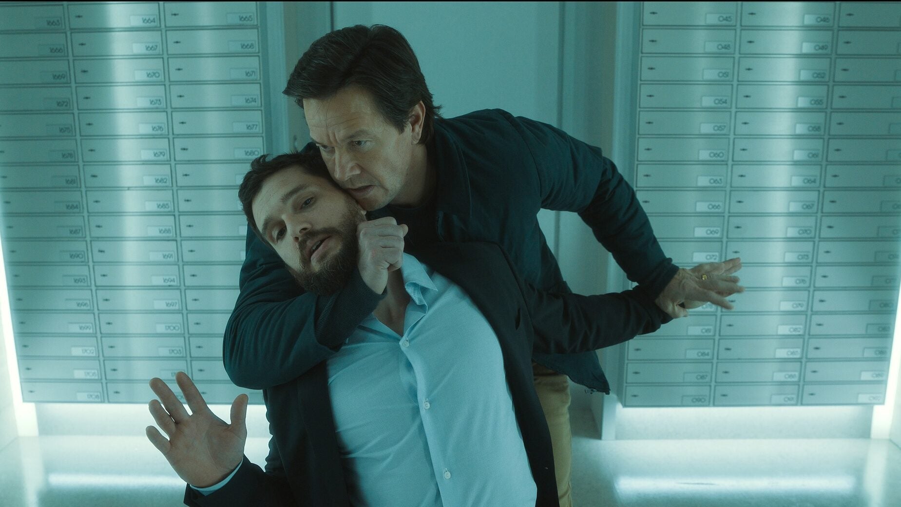 Mark Wahlberg and Kit Harrington in "The Family Plan 2," now streaming on Apple TV.