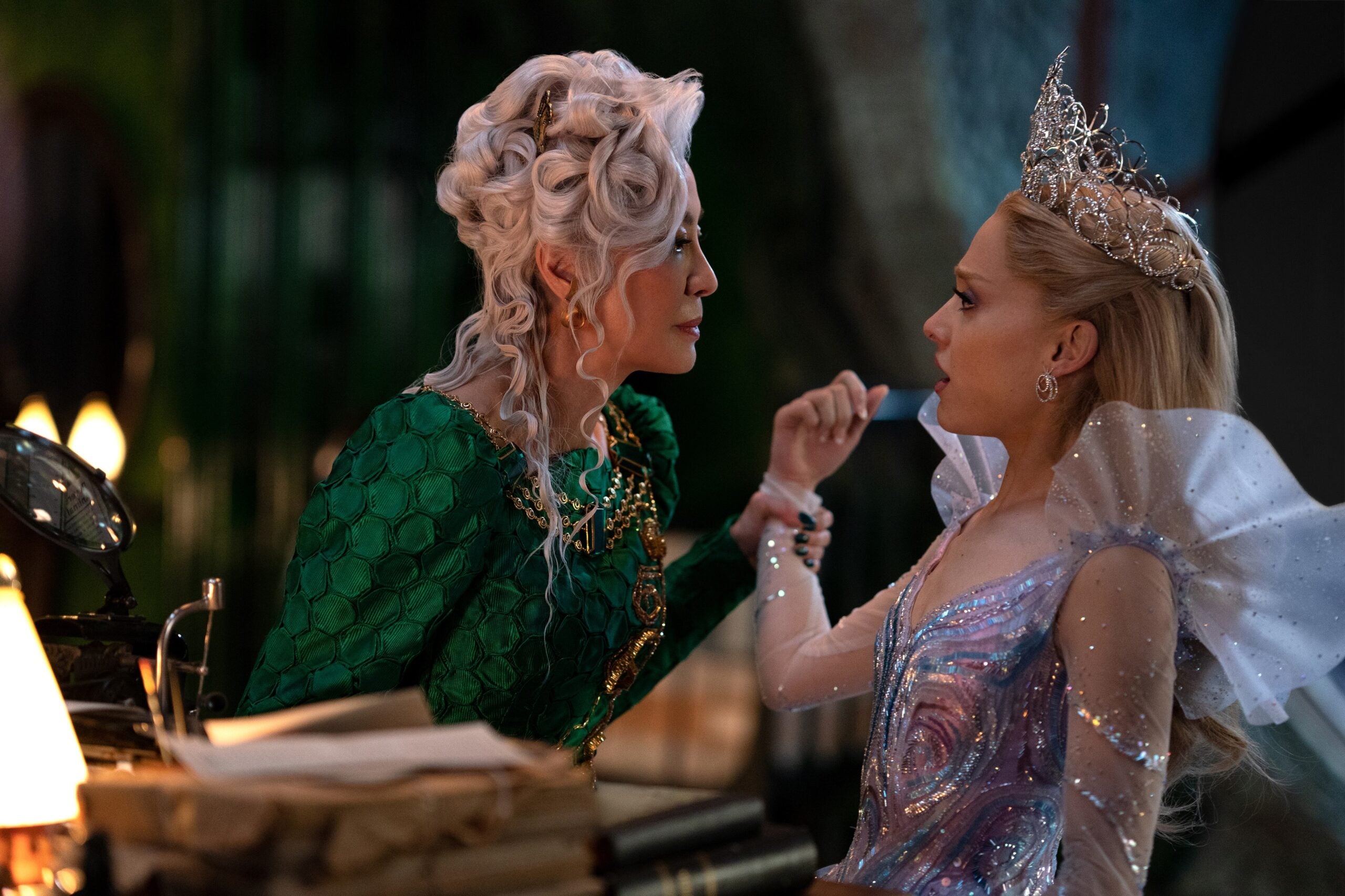 Michelle Yeoh as Madame Morrible, left, and Ariana Grande as Glinda in “Wicked: For Good.”