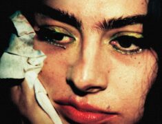 Watch Charli XCX Hide Inside a Giant Lighter in New The Moment Trailer