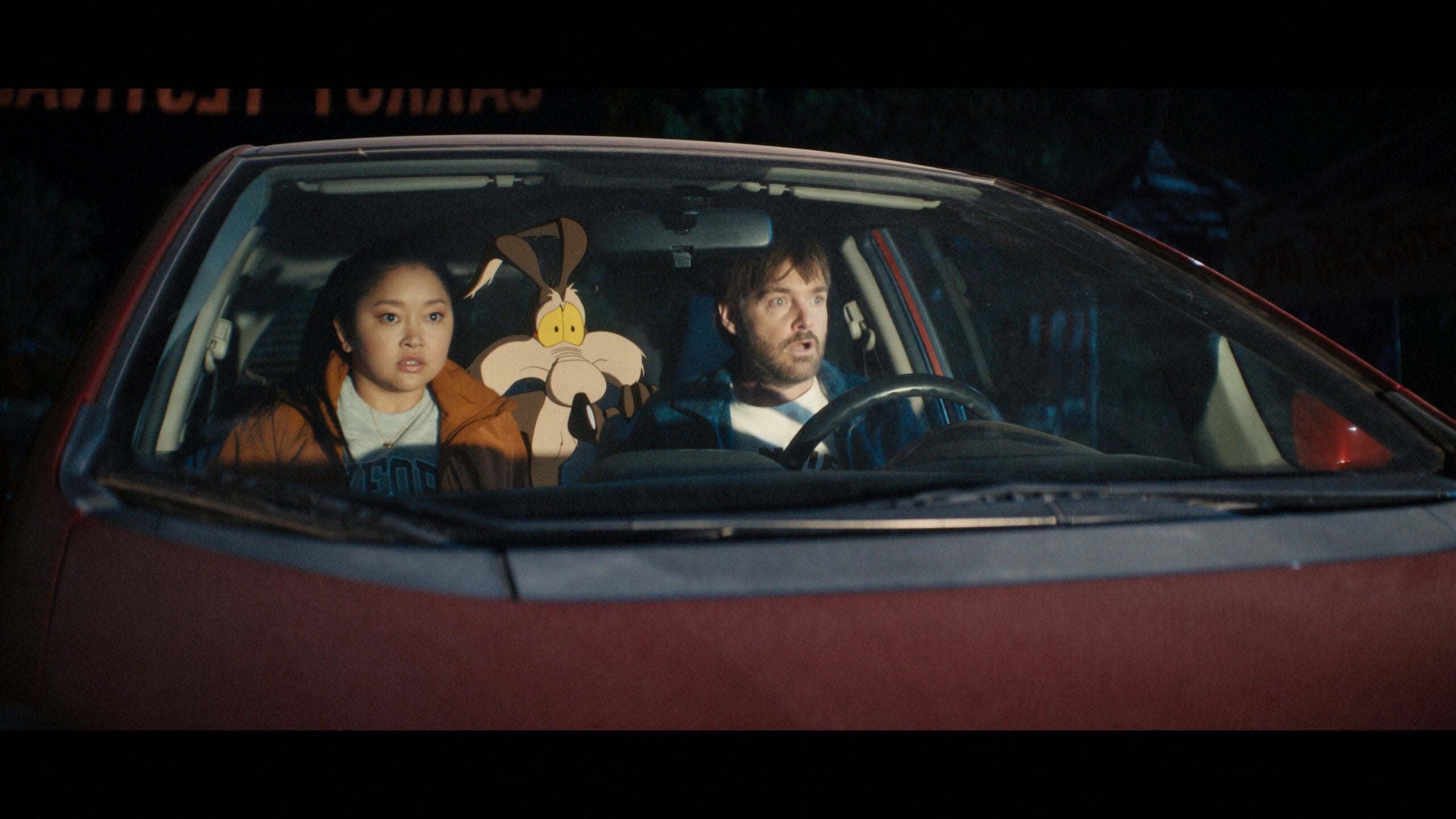 Lana Condor, left, and Will Forte in a scene from the film "Coyote vs. Acme."