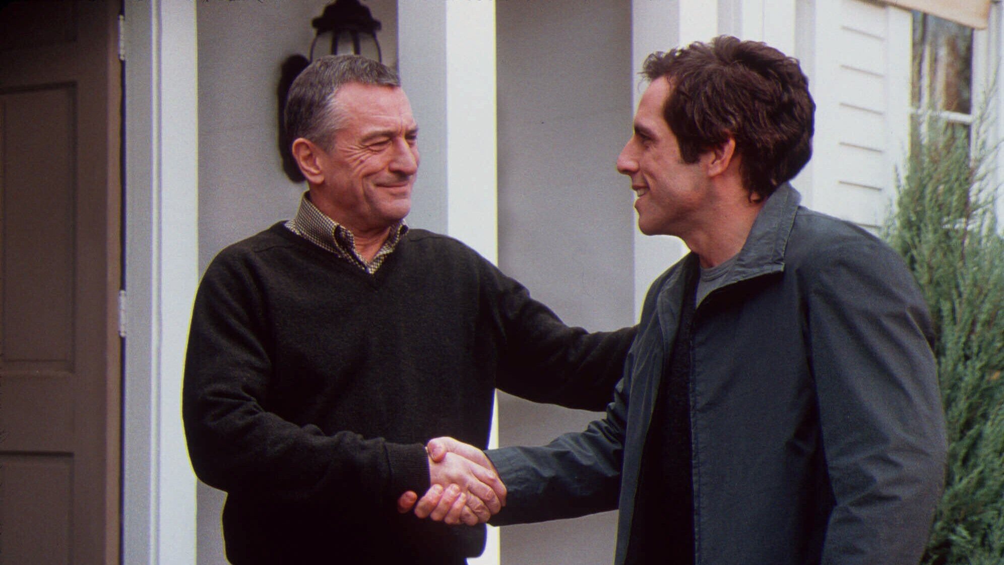 Greg Focker (Ben Stiller, right) meets his girlfriend's father Jack Byrnes (Robert De Niro, left) in 'Meet the Parents.