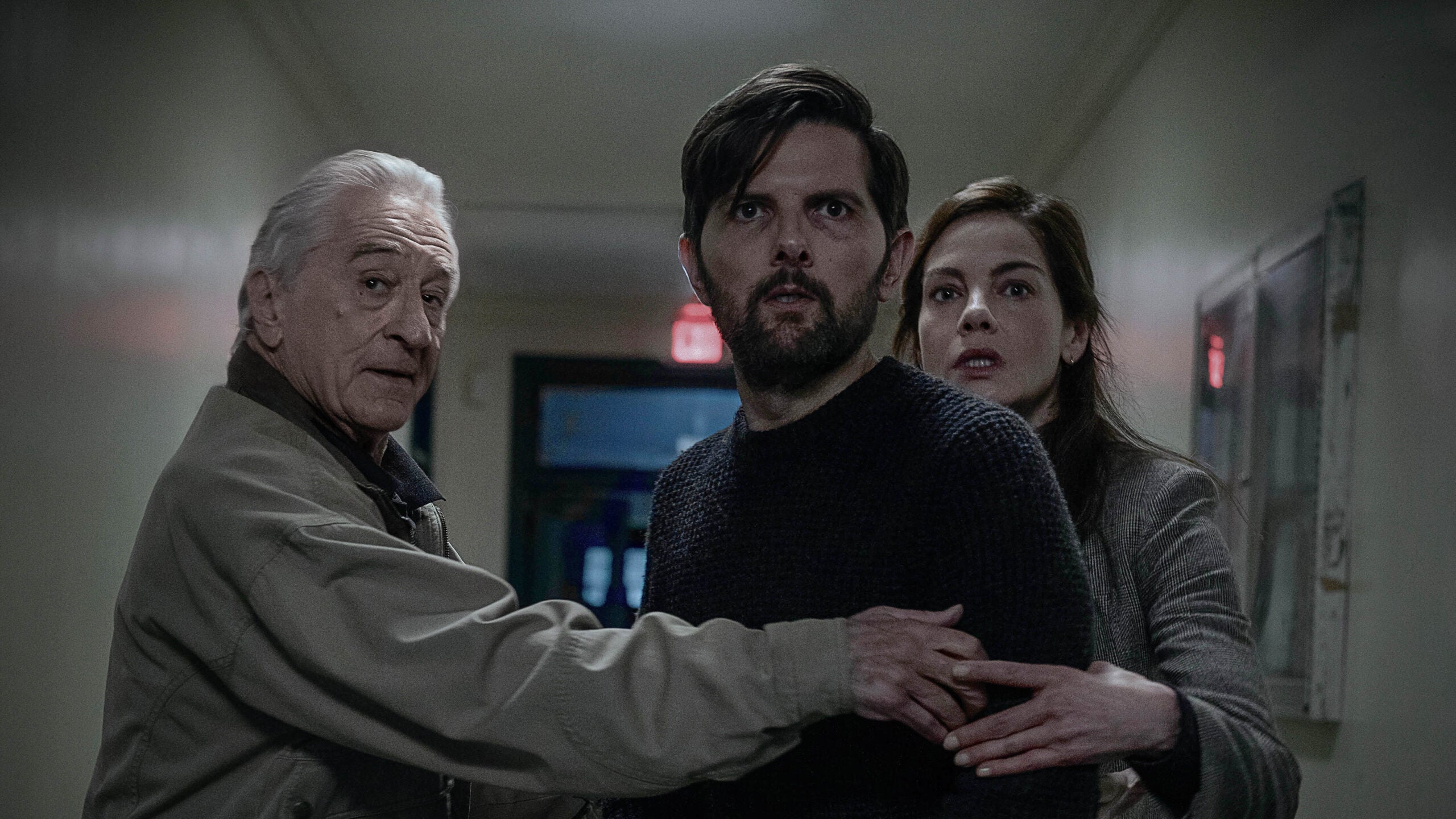 Robert De Niro as Peter Willis, Adam Scott as Tom Kennedy and Michelle Monaghan as Amanda Beck in "The Whisper Man."