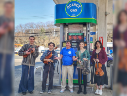 Violists serenade customers at Quincy Gas
