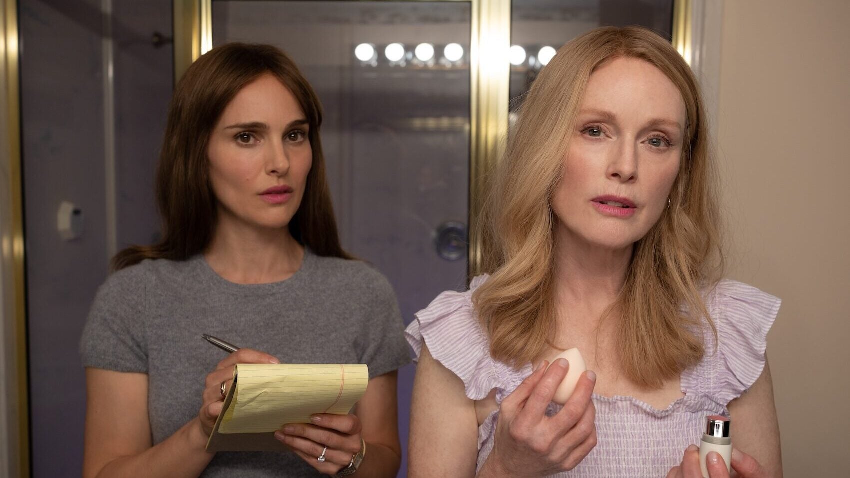 Natalie Portman as Elizabeth Berry and Julianne Moore as Gracie Atherton-Yoo in "May December."